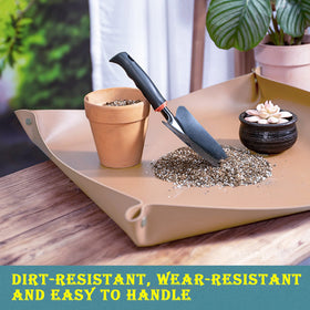 WondMall plant mat protecting table during messy tasks.