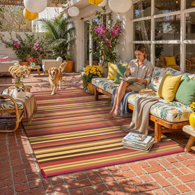 WondRg rug with red-orange stripe for versatile layouts.