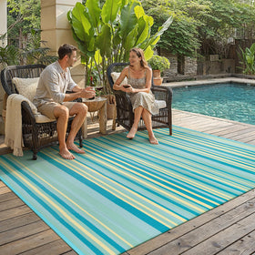 WondRg reversible stripe rug showing two looks for outdoor decor