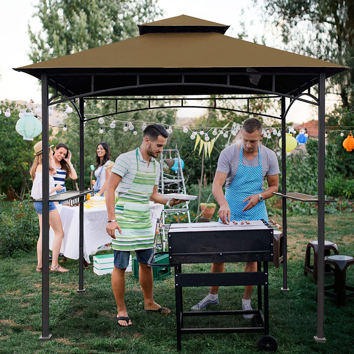 Wonwon outdoor cooking shelter provides shade and wind resilience.