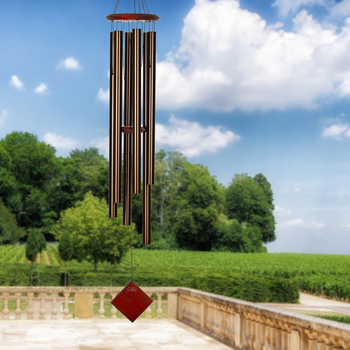 Woodstock Chimes Neptune wind chime wood top features bubinga finish for elegance and durability
