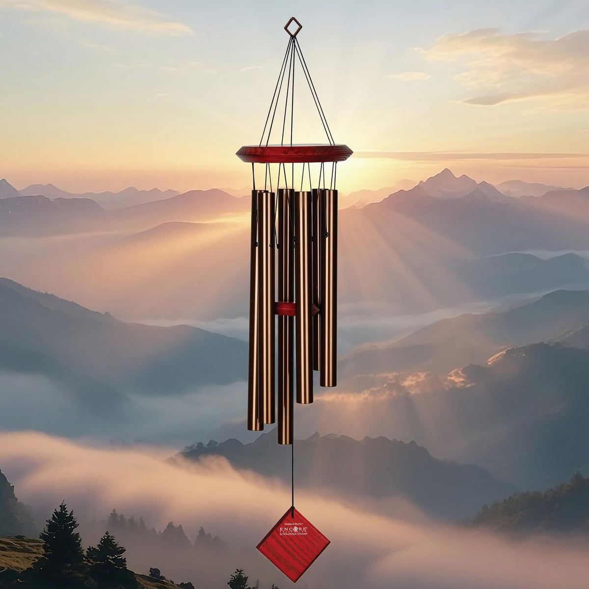 Pluto wind chime by Woodstock Chimes showing Bubinga wood top for elegant outdoor decor