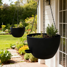 WOUSIWER self-watering hanging planter inside view demonstrates compact setup for apartment greenery.