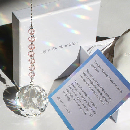 WOOWA Light Memory Rose crystal suncatcher casting hopeful rainbows in sunlight
