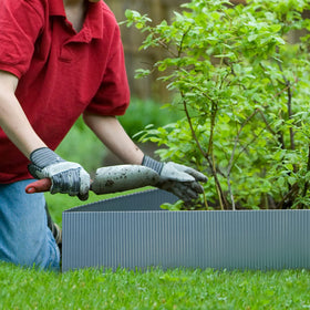 Worth galvanized steel edging flexes to fit curved garden beds for smooth curves.