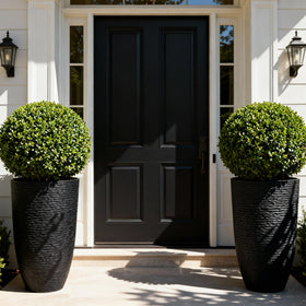 Worth Garden black round planter in 9-gallon size for outdoor use.