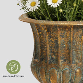 Worth Garden urn planter filled with herbs creates a practical, fragrant kitchen corner.