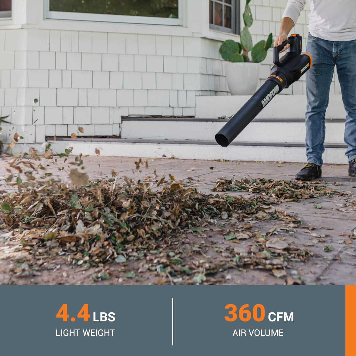WORX mini-mower attachment trimming near garden beds.