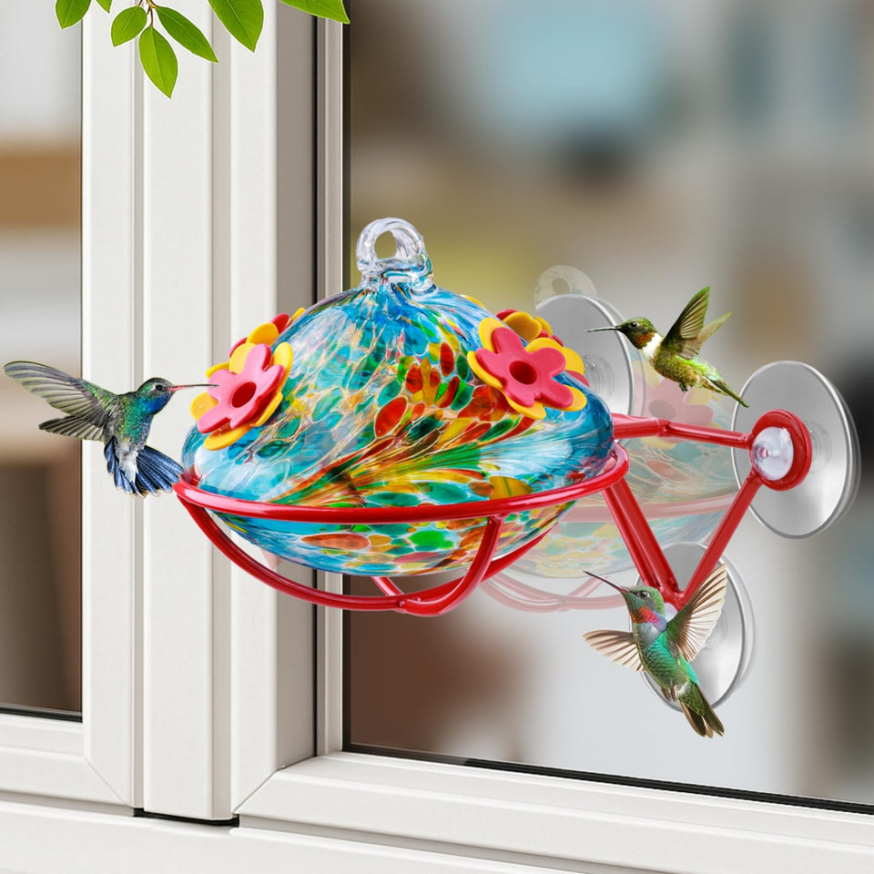 WOSIBO window hummingbird feeder in blue glass draws hummingbirds to your garden.