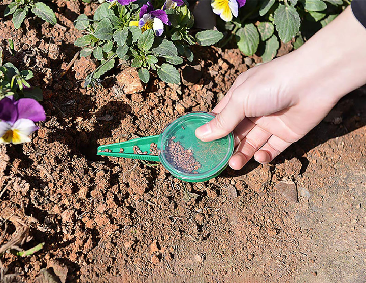 Wowoda seedling dibber and widger easing transplanting into soil