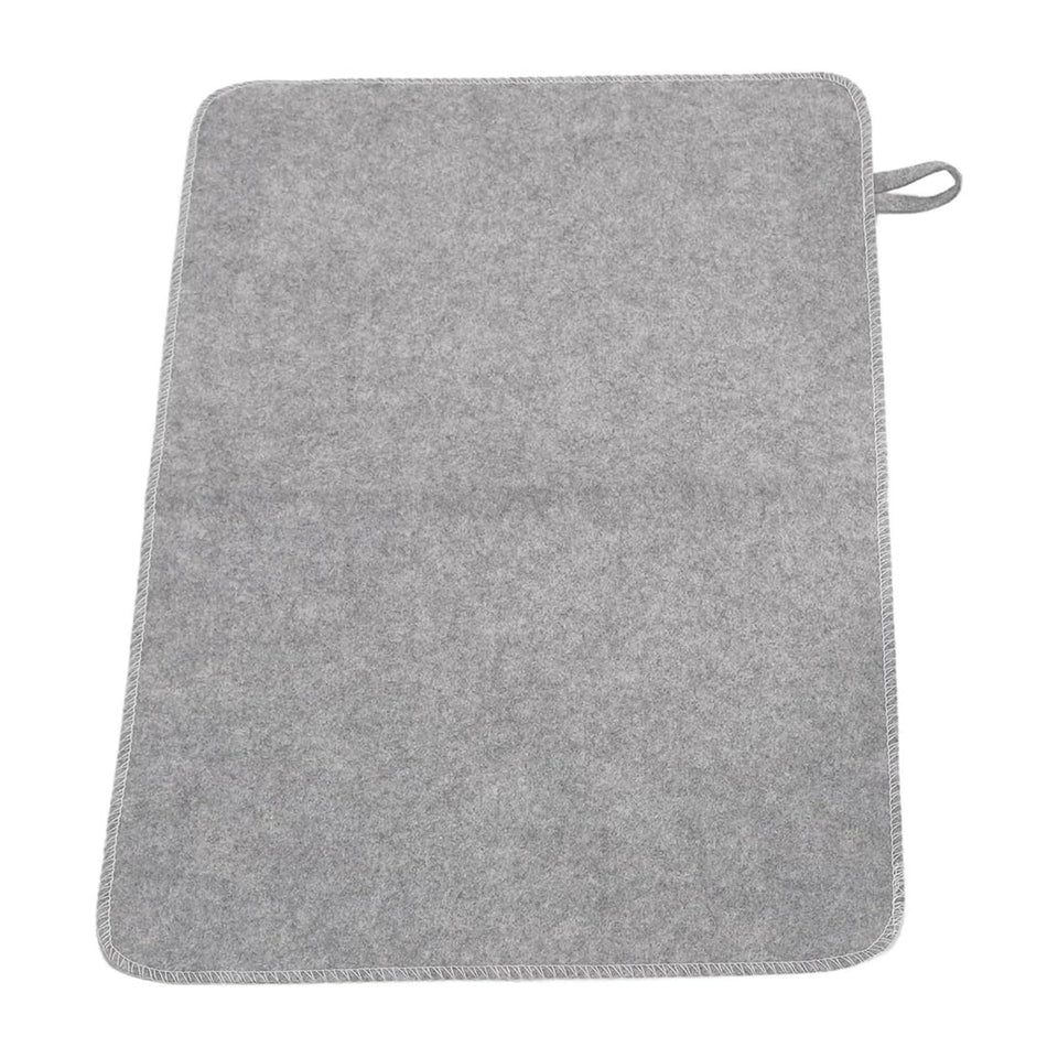 WQAPVHBG felt sauna cushion on bench for compact seating.