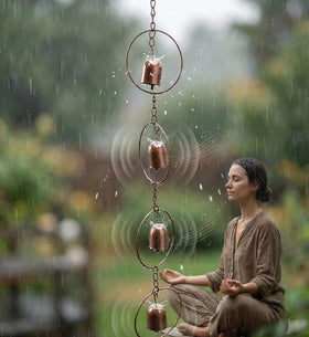 WQAPVHBG iron rain chime with copper finish complements outdoor décor