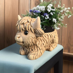wsmart Highland Cow Planter with succulents demonstrates versatile indoor greenery displays