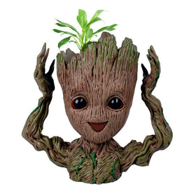 WT WINGTENG Groot planter face-smile adds a playful decor accent for indoor spaces.