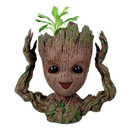WT WINGTENG Groot planter face-smile adds a playful decor accent for indoor spaces.