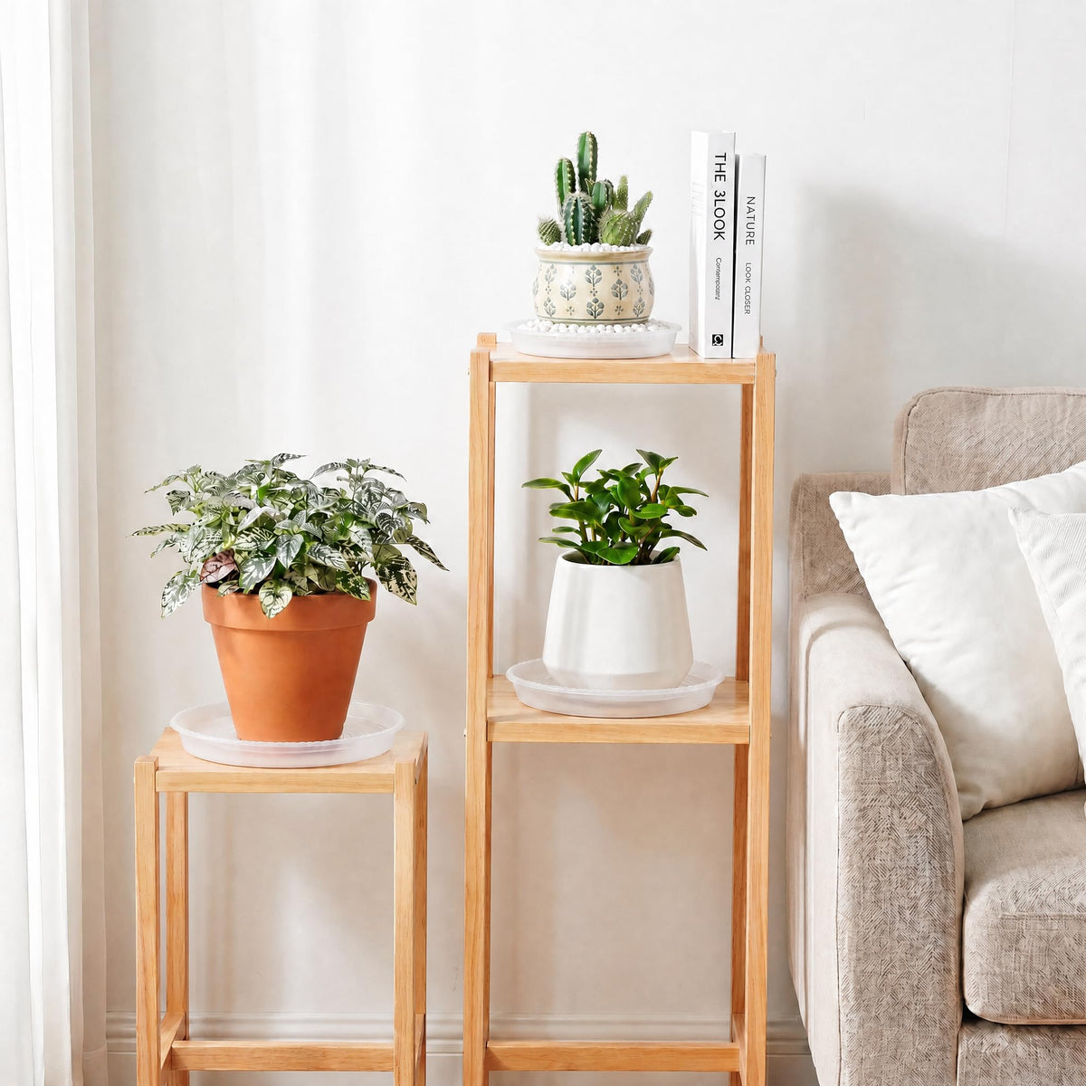 WTXHOP 9-inch clear plant saucer on wooden table protects floors from moisture.