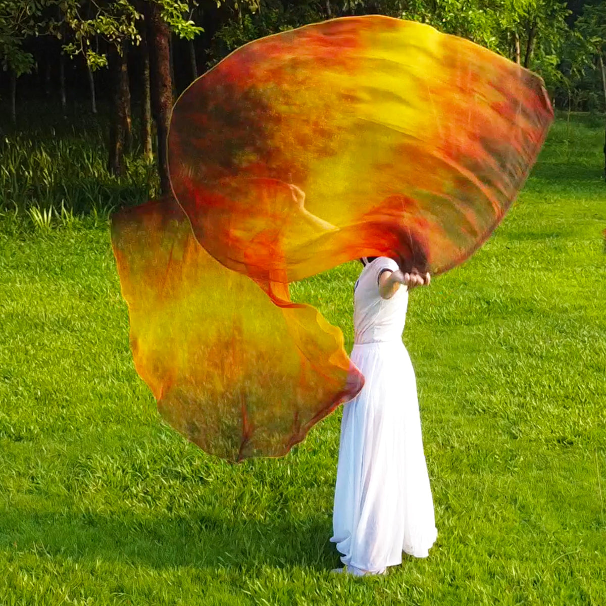Lightweight chiffon fabric adds graceful movement and color flow