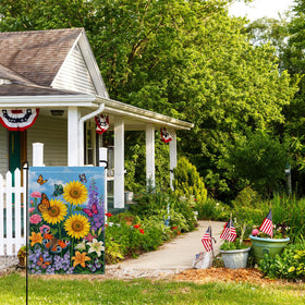 Wyooxoo double-sided floral garden flag visible from both sides in garden setting