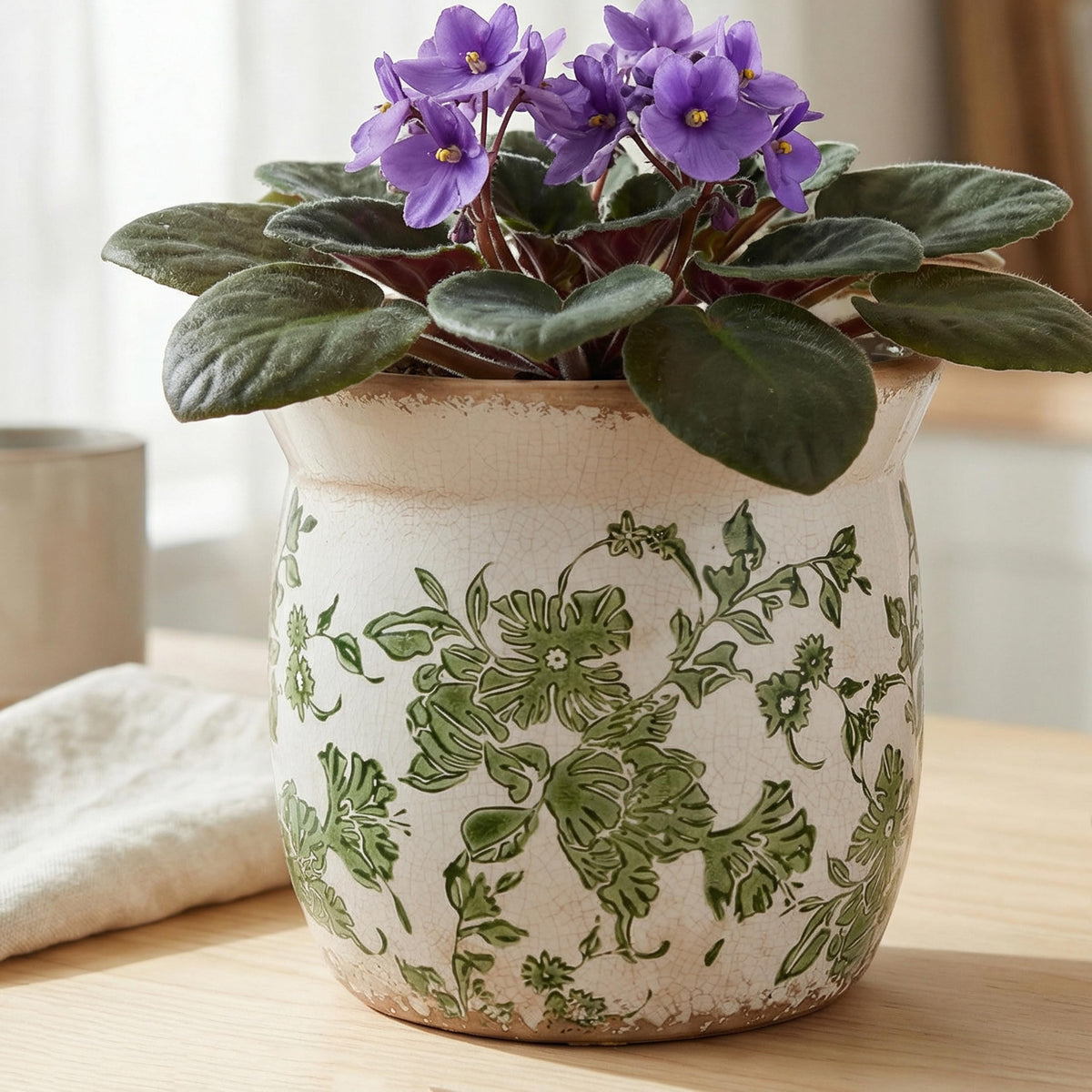 Xiaan Jiaju crackled glaze close-up highlights artisanal craftsmanship for plant lovers.