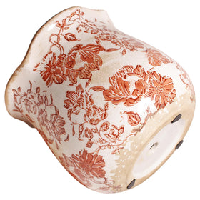 Xiaan Jiaju terracotta-toned planter closeup emphasizes warm texture and distressed finish.