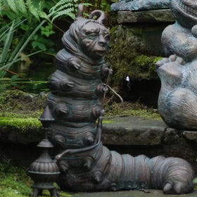 Xieyaxie Alice statues set forms a magical garden focal point.