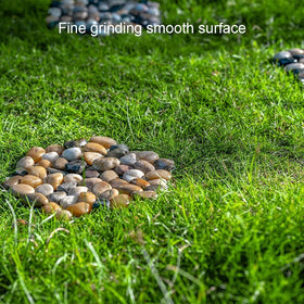 Xindian hexagon pebble mats blend with grass for natural landscaping