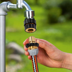 Xiny Tool garden hose nozzle and faucet setup in action for yard tasks