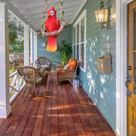 XKFLAUHM breeze-friendly parrot figurine for garden.