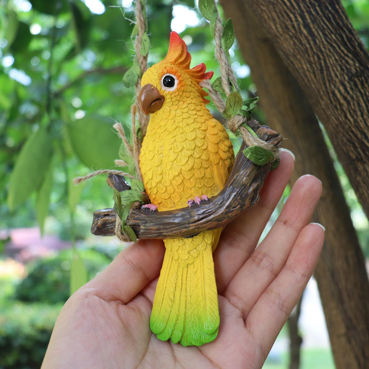 Compact hanging parrot fits on hanging plants, porches, patios, or tree branches.