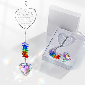 XLSJGYP crystal suncatcher with a heart prism catching sunlight to create colorful reflections.