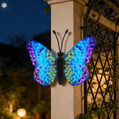 XMHBCSM Solar Butterfly wall decor wings glow, enhancing garden ambiance.