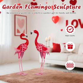 XONOR flamingos stand tall in a garden or yard scene.