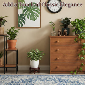 Xosjska wooden plant stand in a room setup showing versatile use