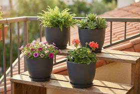 XQSHPDM all-weather planters suit indoor and balcony setups with a tray included.