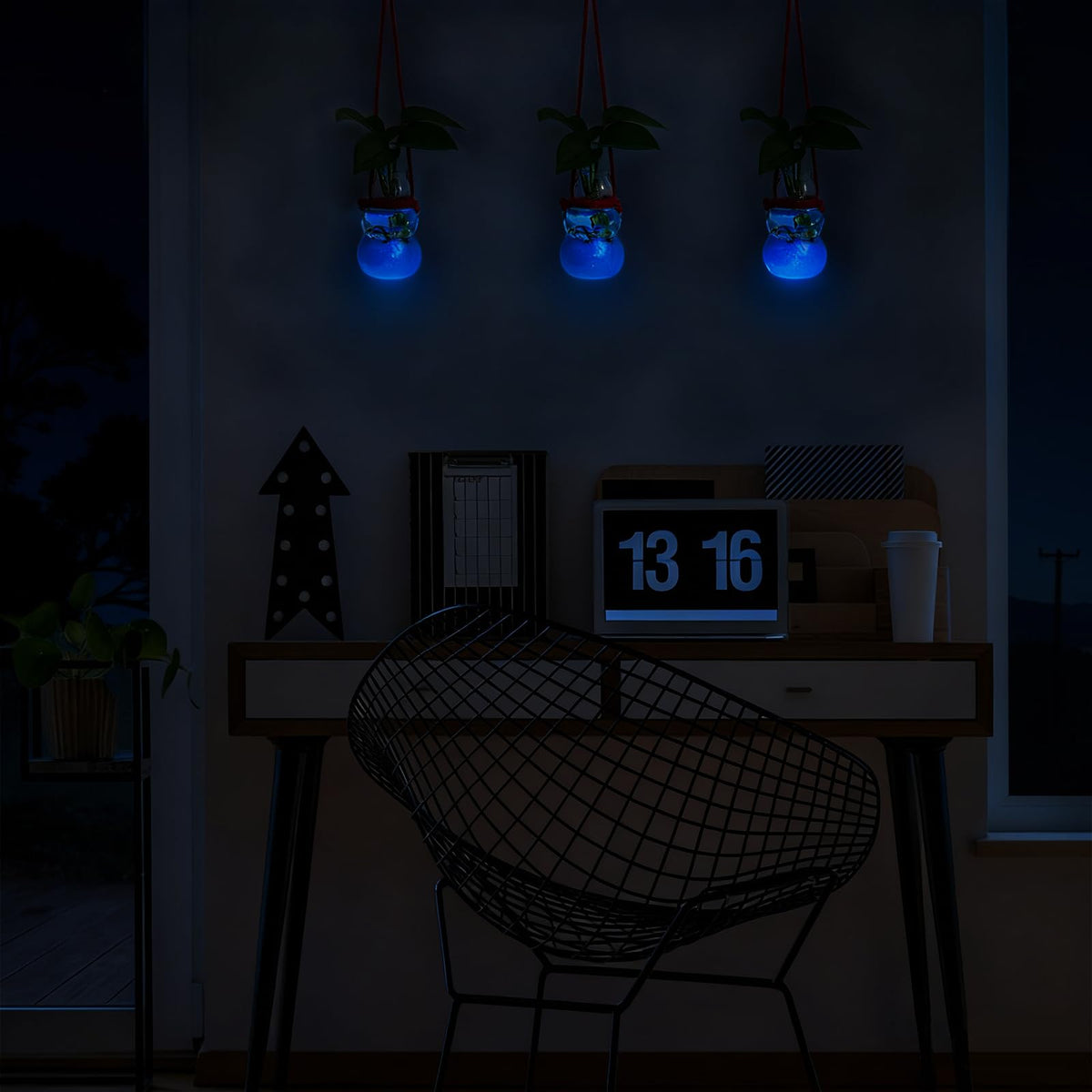 XXXFLOWER blue luminous sand inside station creates moody, winter-like ambience.