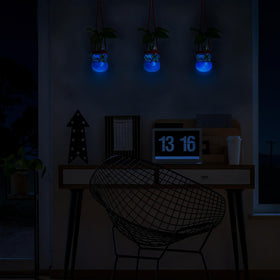 XXXFLOWER blue luminous sand inside station creates moody, winter-like ambience.