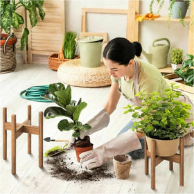XZXWZX sturdy-frame plant stand provides stable support for greenery.