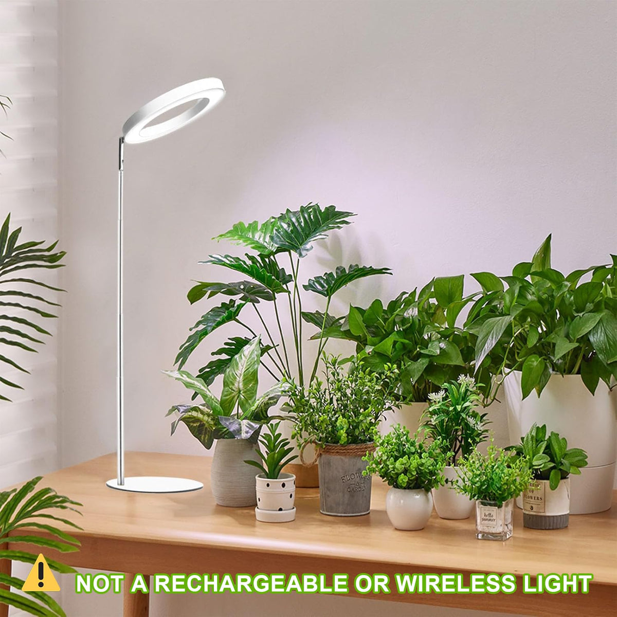 Yadoker compact grow light on a desk for space-saving herb cultivation