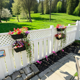 YAHKBTEN black railing planter setup enhances outdoor porch aesthetics.