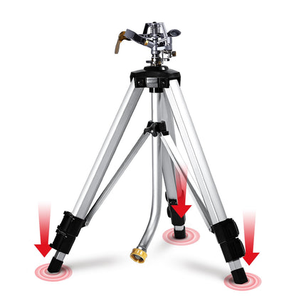 YAMATIC impact sprinkler on adjustable tripod base for stable lawn irrigation on uneven ground