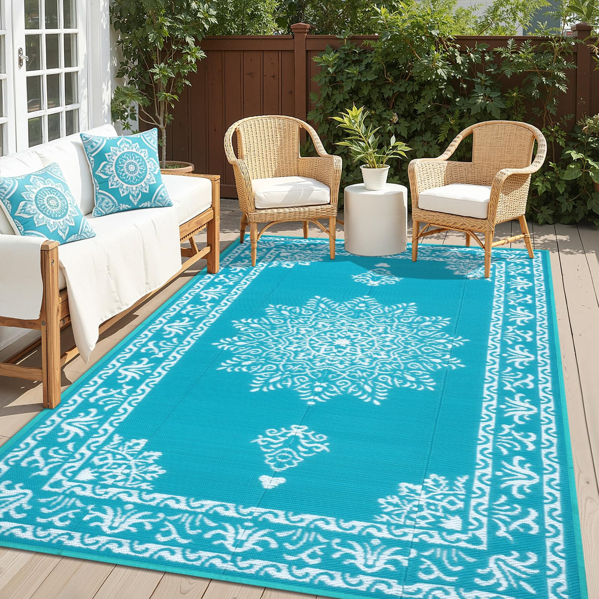 Yamaziot 6x9 ft outdoor rug in teal for patio, waterproof and durable.