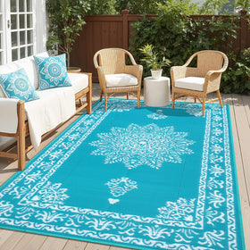 Yamaziot 6x9 ft outdoor rug in teal for patio, waterproof and durable.
