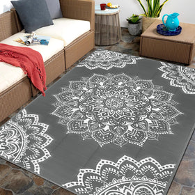 Yamaziot waterproof outdoor rug with grey reversible straw texture for patios.