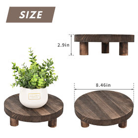 Yangbaga burnt-wood display stand adds texture to outdoor decor.