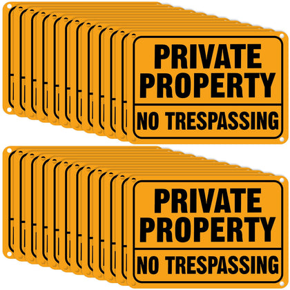 Yaocom no-trespassing sign 7x10in, yellow and black, clearly marks private property for outdoor visibility.