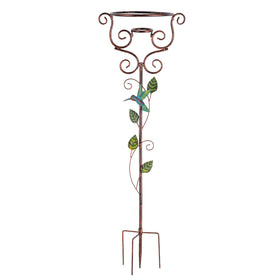 YELENEW gazing ball stand with four-prong base framed by hummingbird vines in a garden.