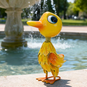 Vibrant color scheme enhances outdoor decor with a playful focal point.