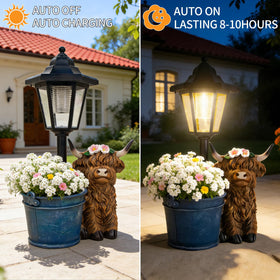 YEPOTUE Highland cow statue lit by solar lantern at night