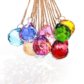 Yesland sun catcher rainbow pendant converts daylight into bright colors.