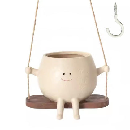 YGGlDUOl Swing Face Planter hanging smiley close-up for cheerful indoor decor